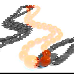 A FINE LARGE VERY RARE HIGH QUALITY BALTIC AMBER NECKLACE 30" 113 GRAMS: THIS LOT INCLUDES A VERY RARE HIGH QUALITY BALTIC AMBER NECKLACE. THE NECKLACE MEASURES 30" LONG AND WEIGHS 113 GRAMS. THE LARGEST BEAD IS 30MM. PROPERTY OF A FLORIDA COLLECTOR. WE PROVIDE FREE