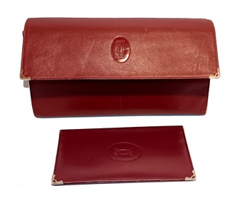 A VINTAGE CARTIER BORDEAUX LEATHER PURSE & WALLET SET - CLASSIC FRENCH ELEGANCE