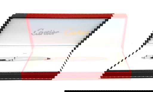 A FINE CARTIER MINI DIABOLO DE CARTIER PINK LACQUER BALLPOINT PEN WITH ORIGINAL BOX: REFINED AND ELEGANT, THIS AUTHENTIC CARTIER MINI DIABOLO DE CARTIER BALLPOINT PEN FEATURES A GLOSSY PINK LACQUER BARREL WIYH PALLADIUM FINISH SILVER TONE ACCENTS. THE CAP IS TOPPED WITH A MATCHING PIN