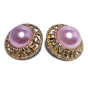 A SUPERB VINTAGE CHANEL LOGO PEARLIZED BUTTONS SET OF 2