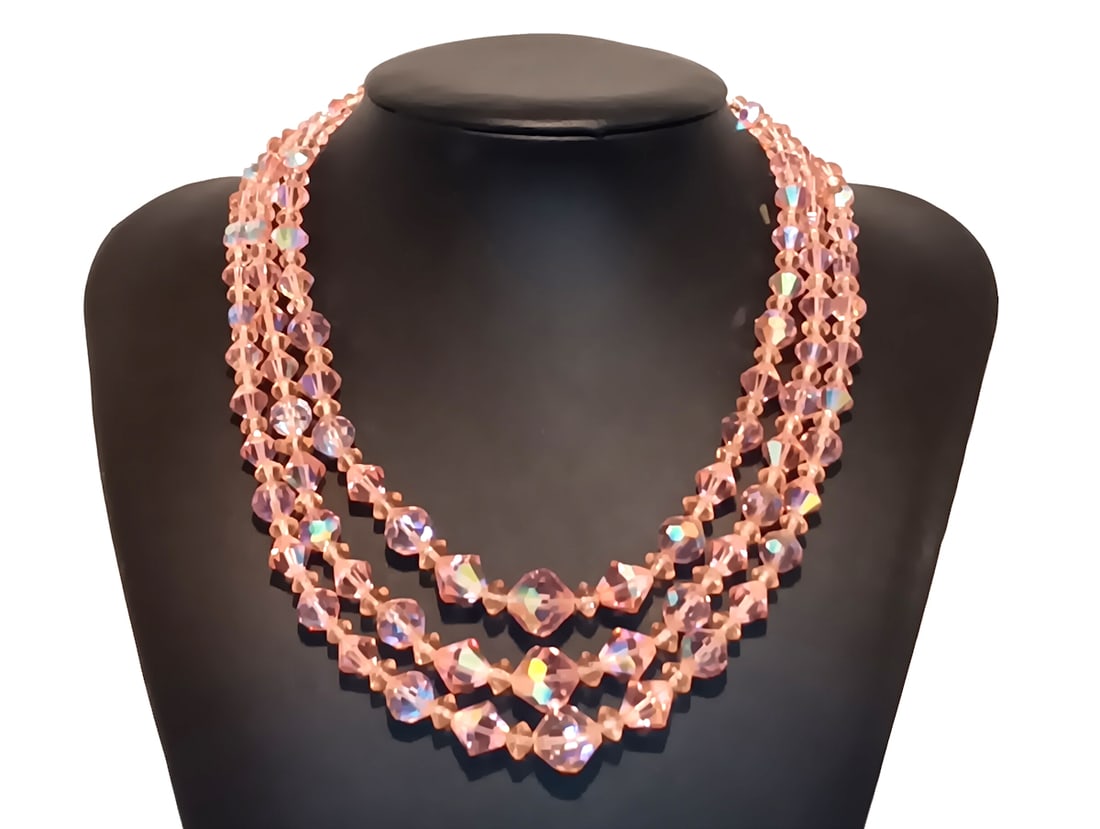 A FINE VINTAGE 3 STRANDS PINK CRYSTALS NECKLACE 15": THIS LOT CONSISTS OF A FINE VINTAGE 3 STRANDS CRYSTALS NECKLACE. THE SHORT STRAND IS 15" LONG. TOTAL WEIGHT 68.5 GRAMS. WE PROVIDE FREE IN-HOUSE SHIPPING WITHIN THE U.S.