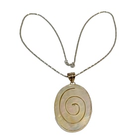 A CARVED VINTAGE MOTHER OF PEARL STERLING SILVER NECKLACE