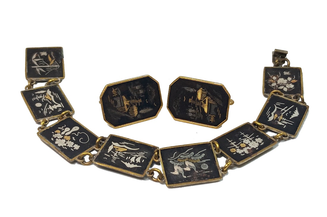 FINE LOT OF VINTAGE JAPANESE DAMASCENE BRACELET AND EARRINGS: OFFERED HERE IS A LOT OF VINTAGE JAPANESE DAMASCENE BRACELET AND EARRINGS. THEY FEATURE FINE IMAGES CREATED WITH GOLD AND SILVER INLAY. THE BRACELET IS 6.75" LONG. WE PROVIDE FREE IN-HOUSE SHIPPING WI