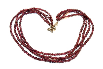 A FINE VINTAGE 4 STRANDS FACETED GARNET BEADS NECKLACE STERLING CLASP