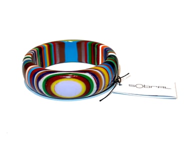 A SUPERB DESIGNER LUCITE BANGLE BY SOBRAL 2.5" D