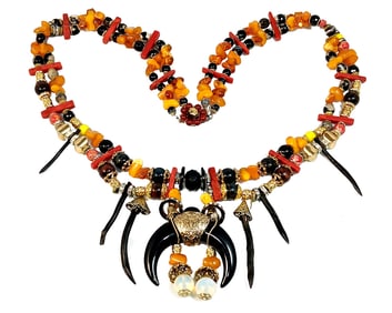 AN IMPORTANT AMBER CORAL GEMSTONE NECKLACE SIGNED BY DESIGNER STEFAN DINU