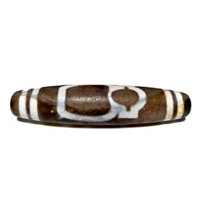 A LARGE SINO TIBETAN MASTER AGATE DZI BEAD MONK PATTERN 70MM