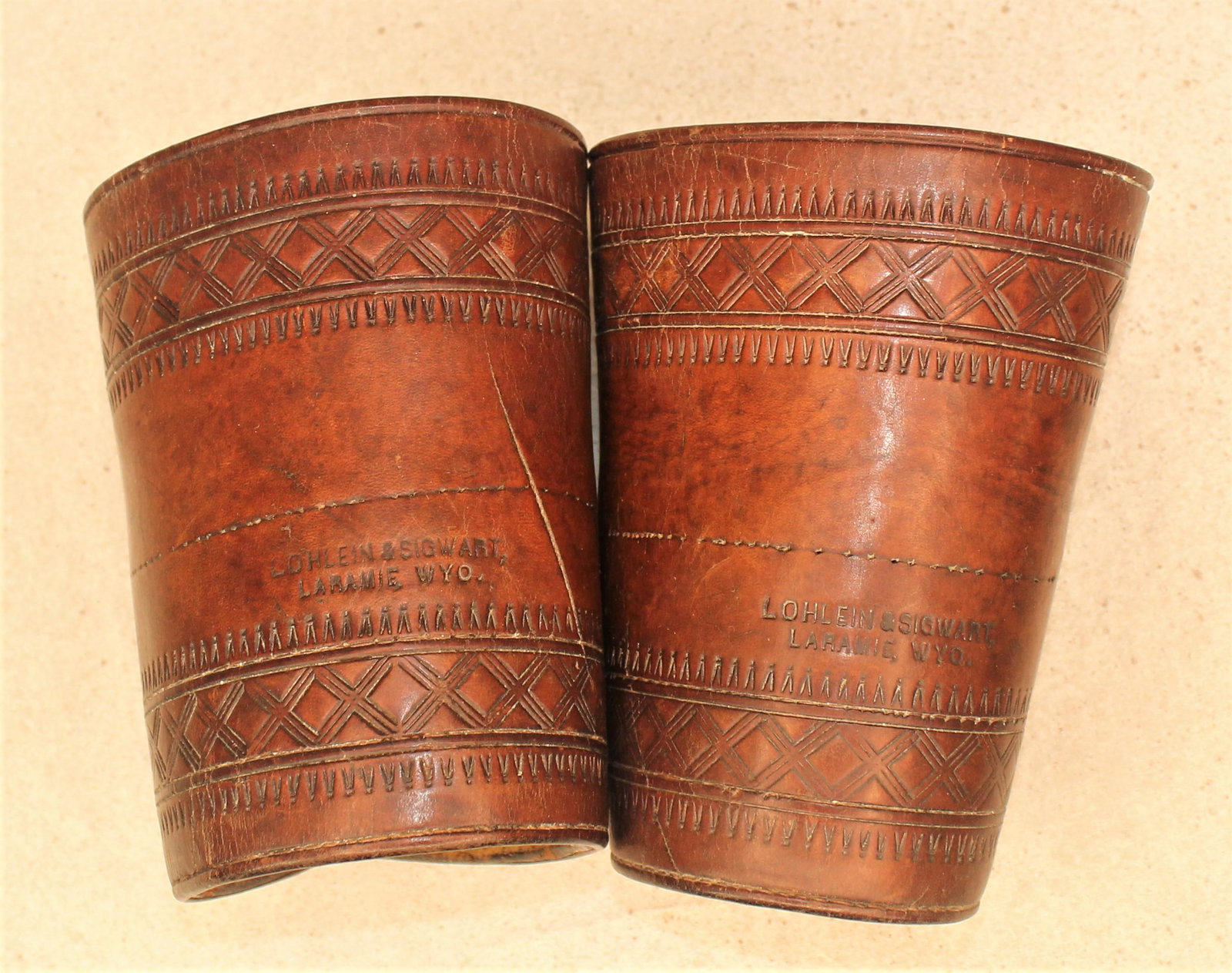 Rare Lohlien & Sigwart Cuffs: Exceedingly rare Laramie, Wyoming made cuffs, showing nice condition, rich color and an uncommon sheepskin lining. Roger Wilmot Collection