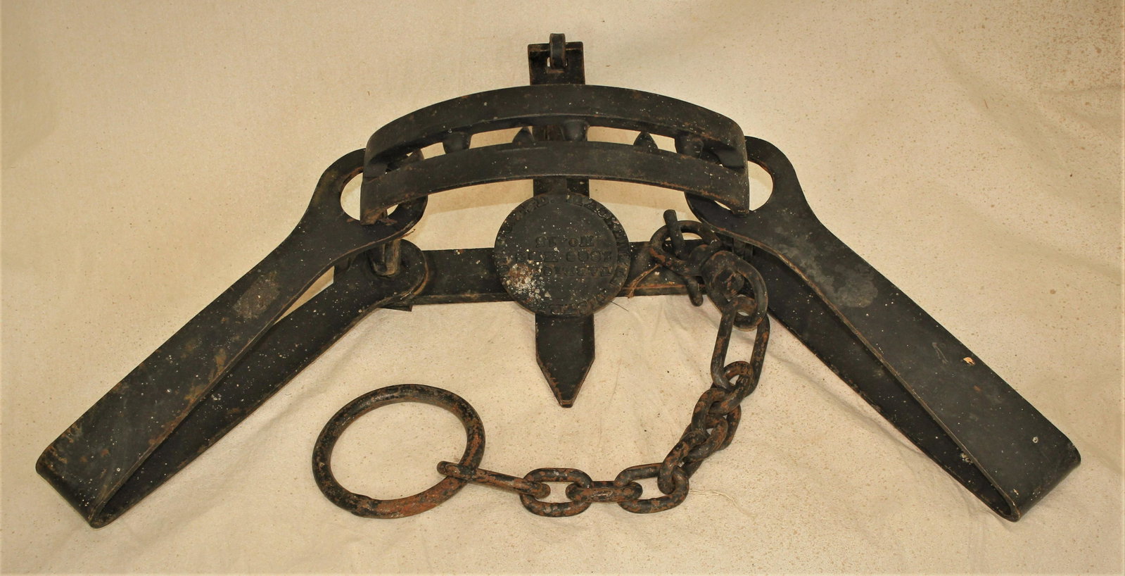 Antique #15 Bear Trap: Very dersirable extra large bear trap with massive 11" jaws with exposed teeth, pan marked "Mackenzie District Fur Co. LTD, #15 HBC 1888", and origanal chain.