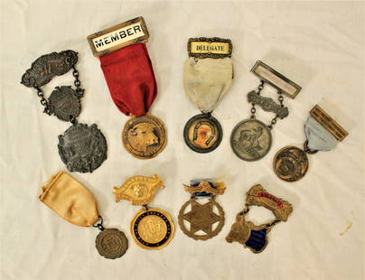 Rare Livestock Commission Medals: Grouping of 9 assorted cattlemans badges and pendants, including numerous great Colorado badges, as well as Wyoming and Oregon badges. Category: Miscellanious