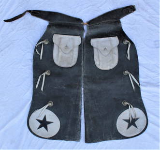 JF Kahle Batwing Chaps: Showy pair of two tone chaps with decorative large pockets and cut-out stars in the corners of the wings, and nicely maker marked. Category: Chaps