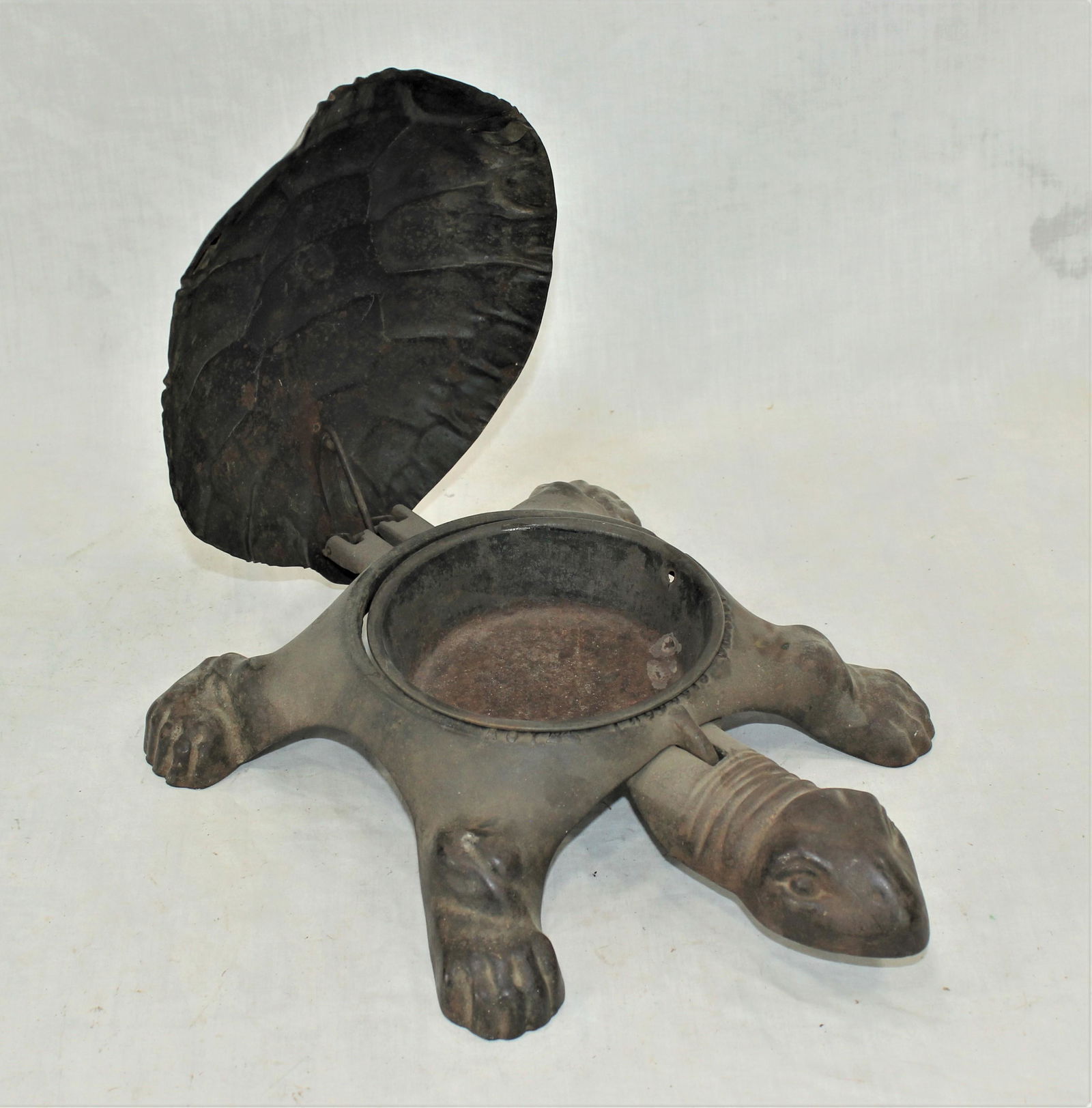 Antique Turtle Spittoon: Very collectable cast iron turtle spittoon with tin pop up shell and bowl.
