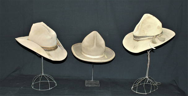 Grouping of Cowboy Hats: Three 1920's-1930's cowboy hats, all displaying desirable maker marked sweatbands, and cowboy wear. 1) Miles City Saddlery 1930's, leather stampede string, 5" "Rancher"crown and 3 1/2" brim 2)