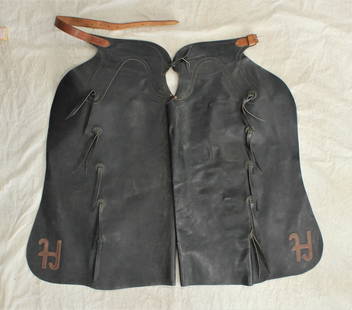 Hamley Batwing Chaps: Huge dark chocolate colored batwing chaps with applied leather ranch brands, with great condition and style.