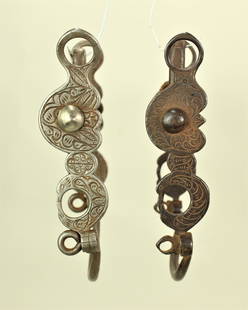 Two Larios Iron Bits: A lot of two early California style iron halfbreed bits, both with fantastic deep engraving and in the classic style of Larios.