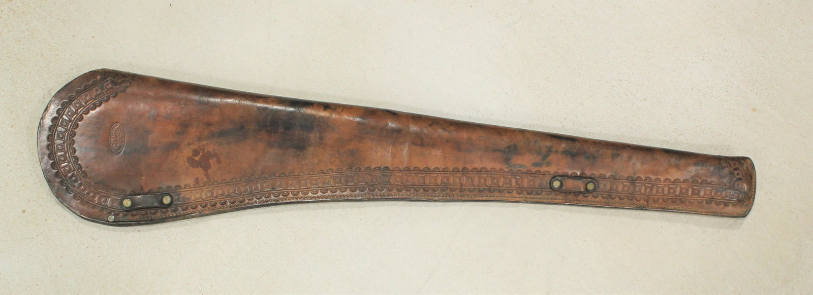 Miles City Saddlery Scabbard: A desirable Miles City rifle scabbard, showing attractive light color, condition and maker's mark.