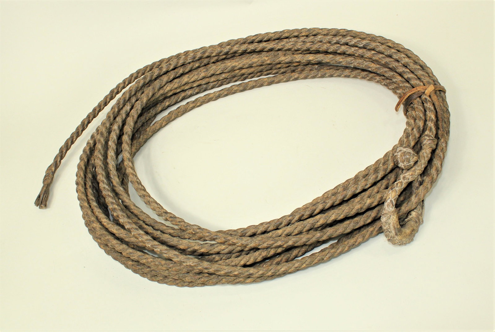 Twisted Rawhide Riata: A wonderful 6 plait, 40ft. rawhide riata with seldom seen twisted style, showing great use and patina.