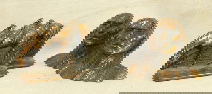 Two Sets of Western Bookends: a grouping of two sets of copper flashed bookends, one being grazing horses and the other of Indian braves.