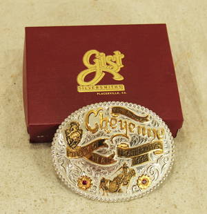 Cheyenne Frontier Days Buckle: A beautifully designed 1998 commemorative belt buckle by Gist, finely engraved, with steer roping scene. Numbered 2 of 100, and including its box.