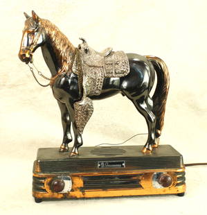 Antique Horse Radio: A showy looking mantle radio with great western flavor, in a nice antique copper toned color, marked "Abbotwares". Measures 12"x 14".