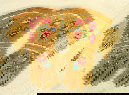 Embriodered Gauntlets: A mint condition pair of gauntlets with brightly flower stitched cuffs.