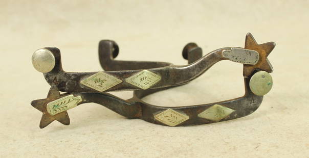 Texas Style Spurs: An interesting single mounted Kelly Bro's style spurs with diamond pattern, with arched gooseneck shanks and "4" marking under the button.