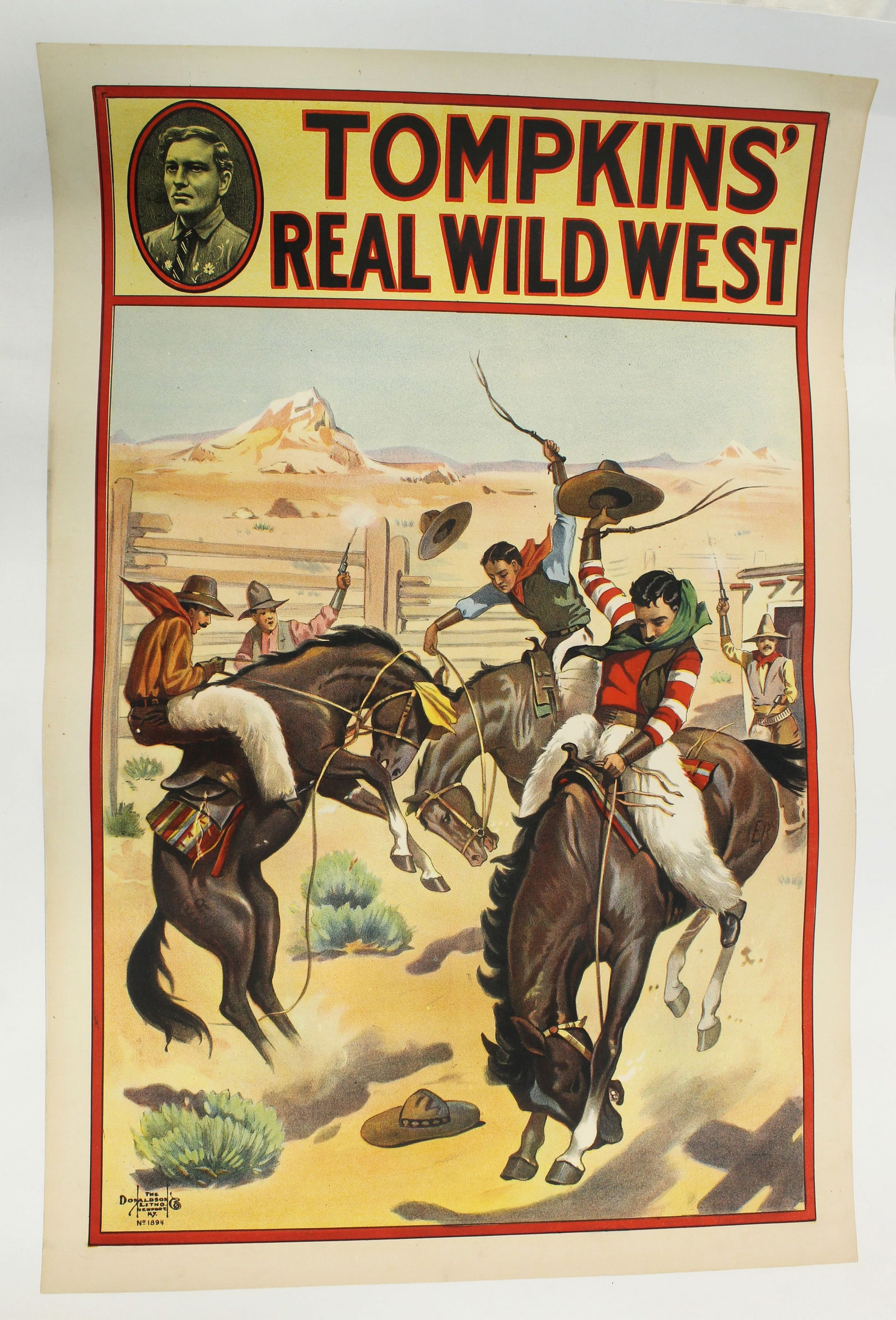 Thompkins Wild West Poster: An action packed Wild West Show poster with great color and presence. In excellent condition, preservation linen backed and measuring 23"x 33".