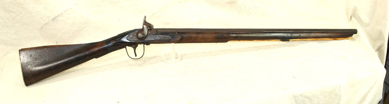 Trade Rifle: 1860-1870 period Northern Plains trade rifle with origins most likely from the Canadian traders of the era. Enfield pattern percussion lock with blacksmith forged fittings and oil finished walnut stoc