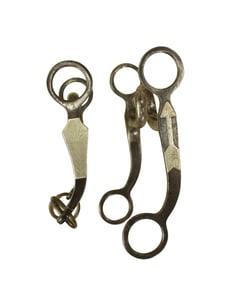 Two classic Crockett Texas style iron grazing bits. One with popular aroow shank.