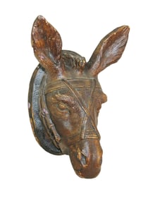 An interesting sculptural wall hanging of a donkey with terrific old patinaed color. Dimensions 12"x