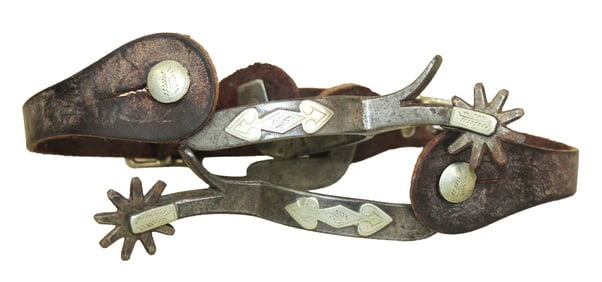 Extra clean pair of double mounted Kelly Bro's spurs with radical chapgaurds, nine point rowels and