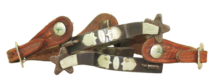 Hard to find single mounted sheild motif spurs with a great look and uncommon maker marks