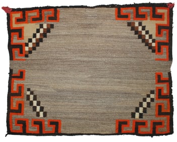 Brightly colored 1920's single saddle blanket. Greek key influenced design edge. Measuring 34"x 27".
