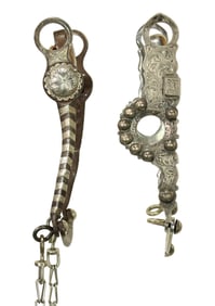 A grouping of two heavily engraved siver show bits, with nice condition and maker's marks.