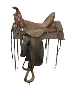 Maker marked kids saddles are hard to find. Here is a border tooled square skirt saddle with a high