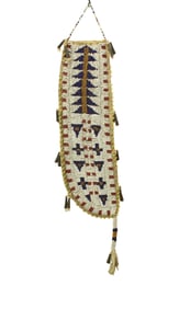 Northern Plains beaded knife sheath with mission crosses and decortive cones. Measuring 10" in
