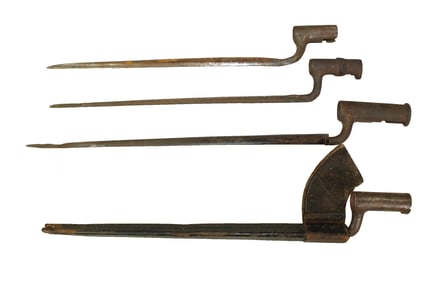 A selection of four antique bayonettes, with different sizes and fitting late 1800's period rifles