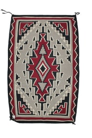 Handwoven Navajo Ganado rug, circa 1940, with bold geometric pattern. Dimensions 42"x 65".
