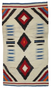 Dazzling bright colored transitional blanket with rare blue, circa 1900, and measuring 36"x 65".