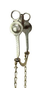 Kelly Bro's Bit: Seldom seen long shanked halfbreed style bit with full overlay, large conchos, and included rein chains.