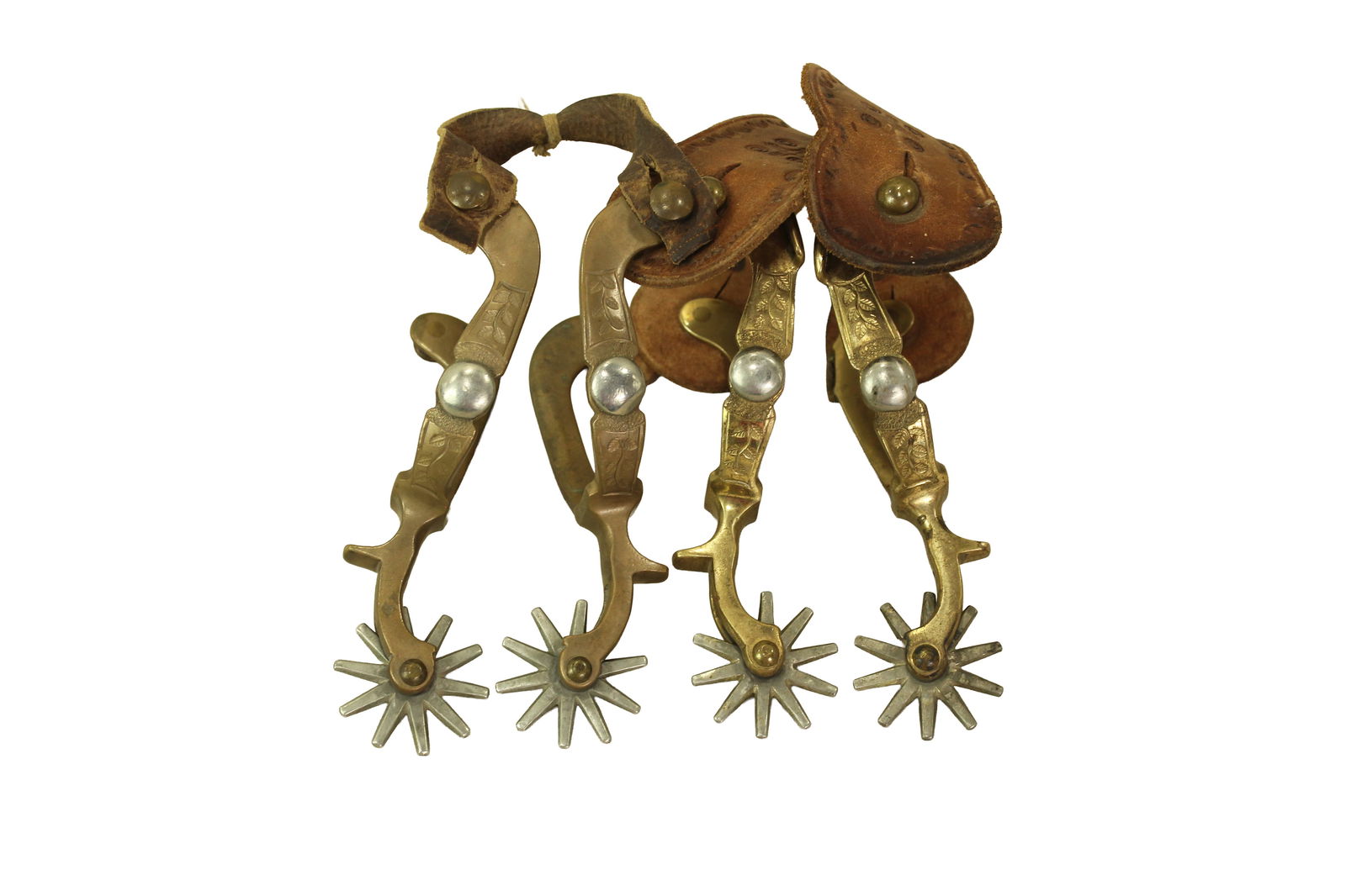 Grouping of Buerman Spurs: Two pair of August Buerman Hercules bronze spurs with single dot patterns.