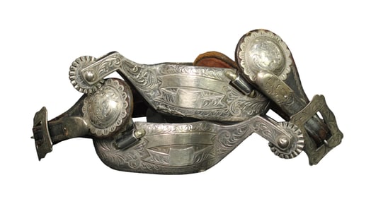 Exceptional pair of wide heelband silver show spurs with extensive engraving, presentaion trophy