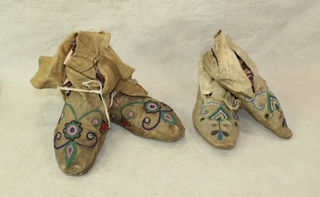 Grouping of two pairs of American Indian moccasins, with detail seed beaded designs and nice
