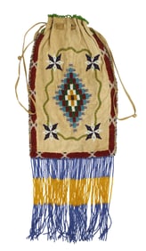 Oversized Southern Indian beaded bag with Vallejo Star pattern adorned by long beaded fringe.