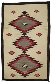 Regional floor rug with large serrated diamonds and great colors. Measures 42"x 69".