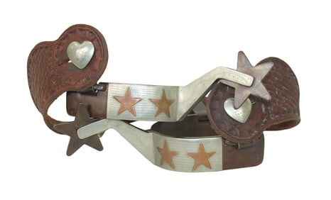 A large pair of Texas style spurs, double mounted with silver and copper star motif. Well marked and