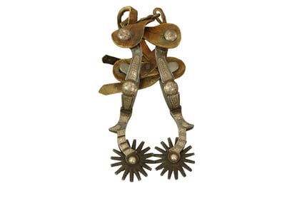 Decorative California style spurs, single inlaid with stylish silver and topped off with large