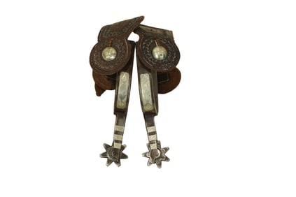 Desirable pair of single inlaid spurs in the style of Canon City, nicely maker marked and completed
