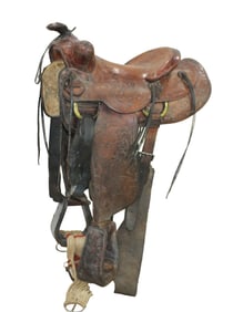Good looking Texas made saddle with full flower tooling, 14 1/2" seat and large bell stirrups.