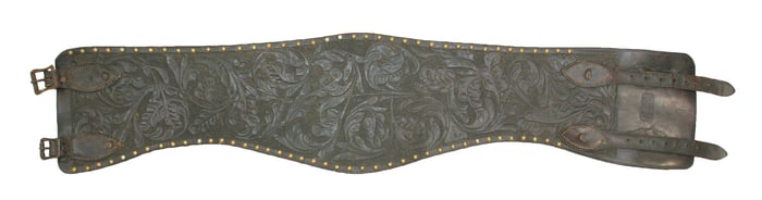 Attractive 6" wide fully flower tooled bronc belt with deep rich color and trimmed with brass studs.